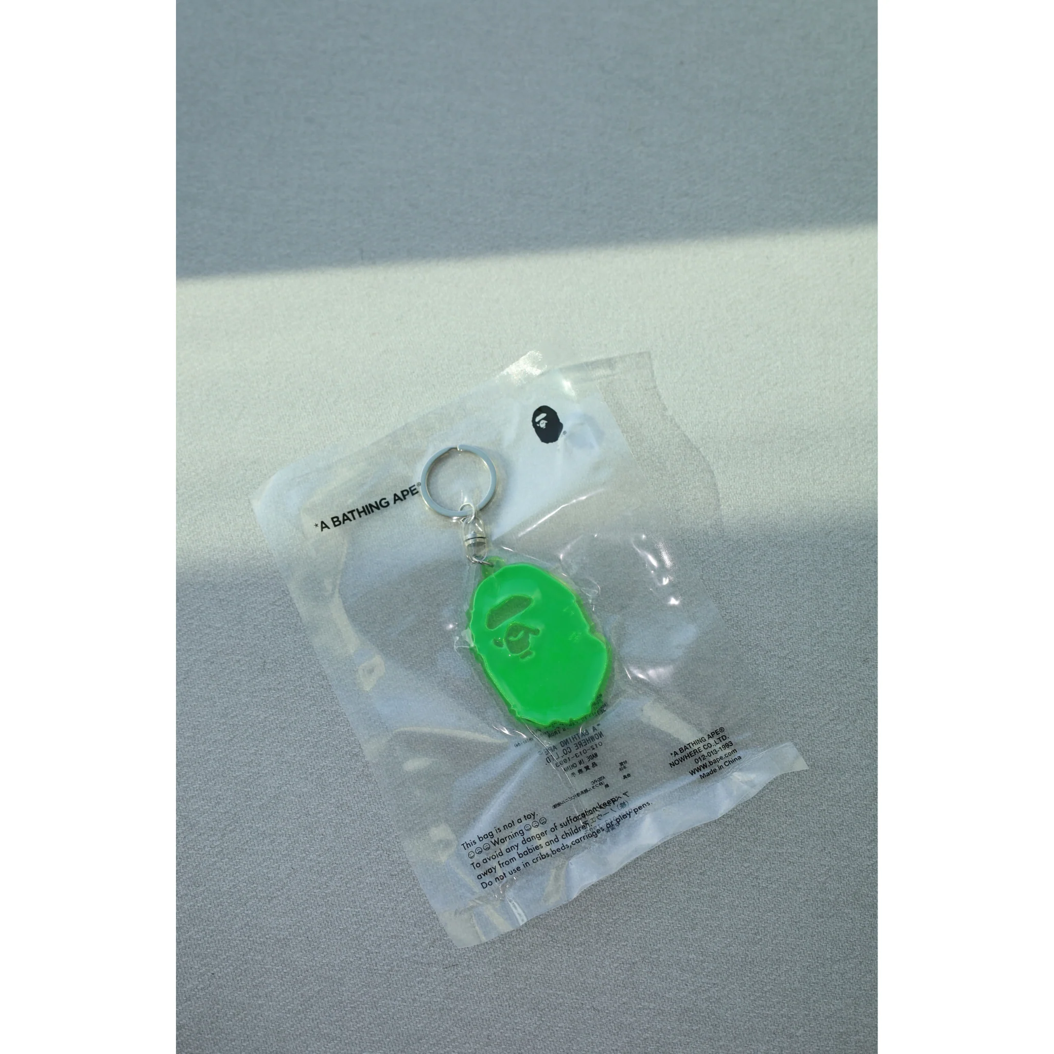 APE HEAD REFLECTIVE KEYCHAIN GREEN